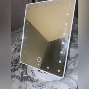 A small/medium vanity mirror that was barely used and just recently bought, sell